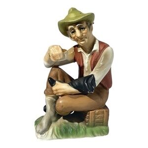 Vintage Norleans Japan Figurine Old Man Shining his Right￼ boot by hand .